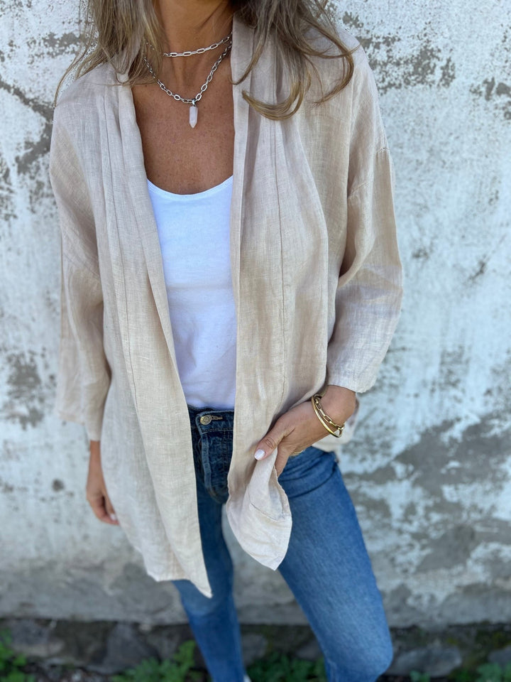 Sweter z lnu z falbankami