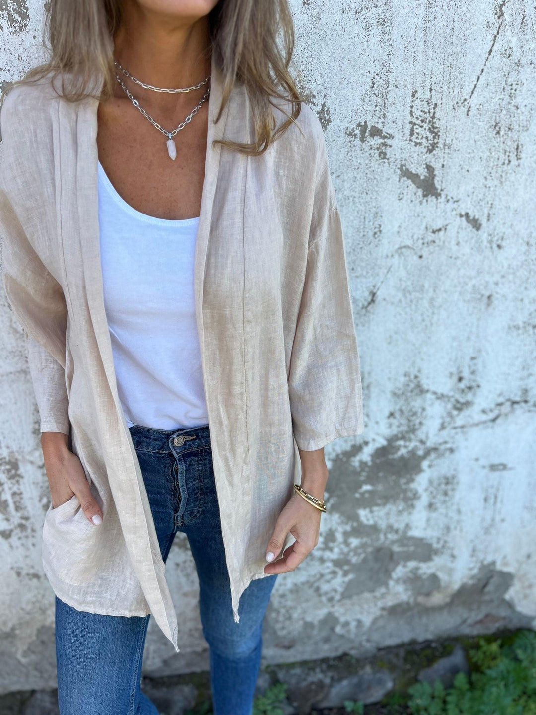 Sweter z lnu z falbankami